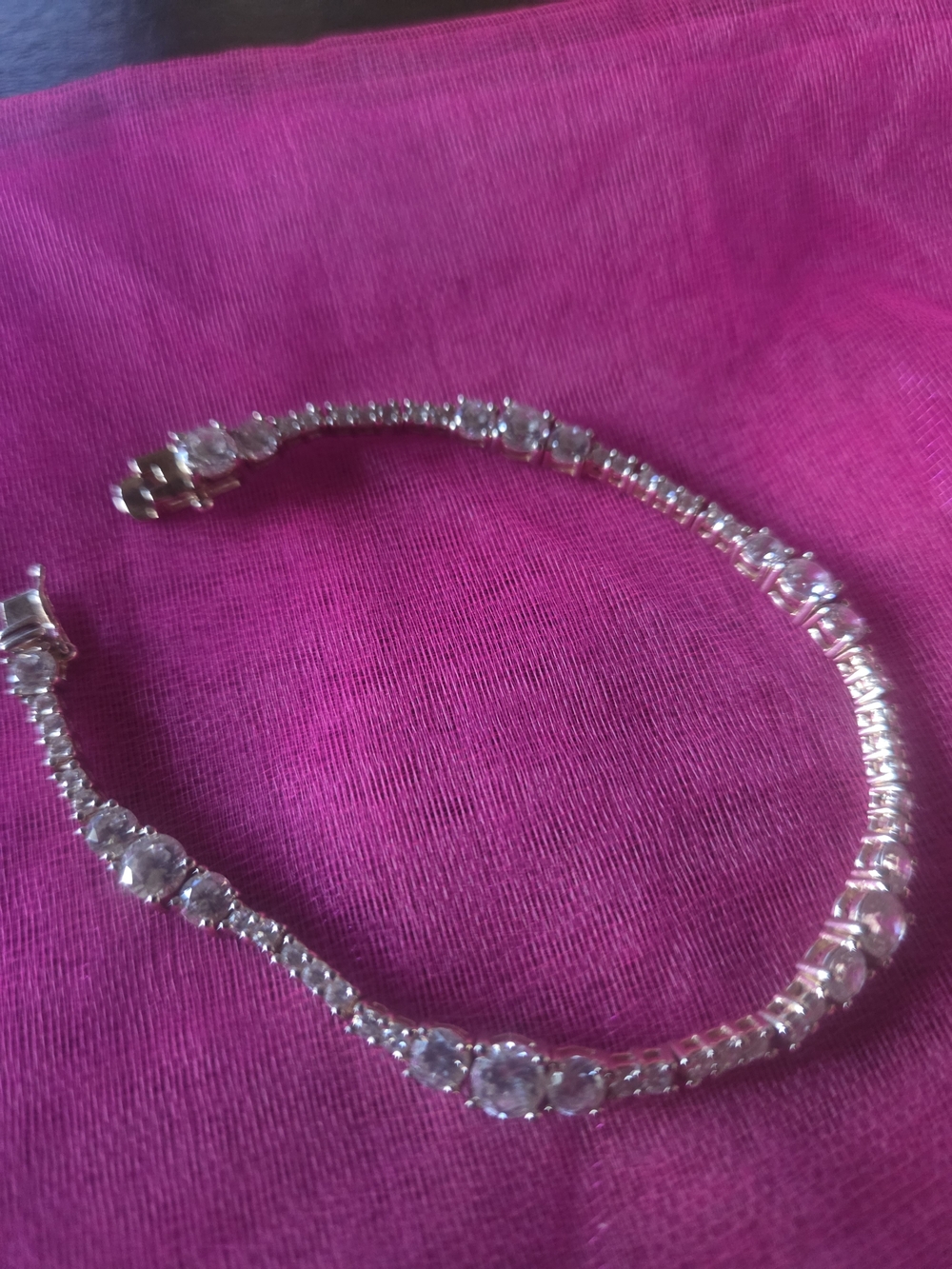 sterling-silver CZ tennis-style bracelet, with larger round CZ 925